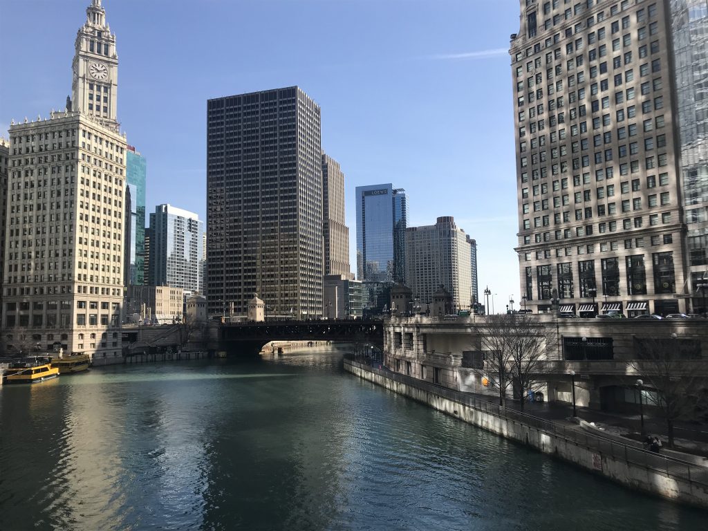 A daylight view of part of downtown Chicago shot over the river.