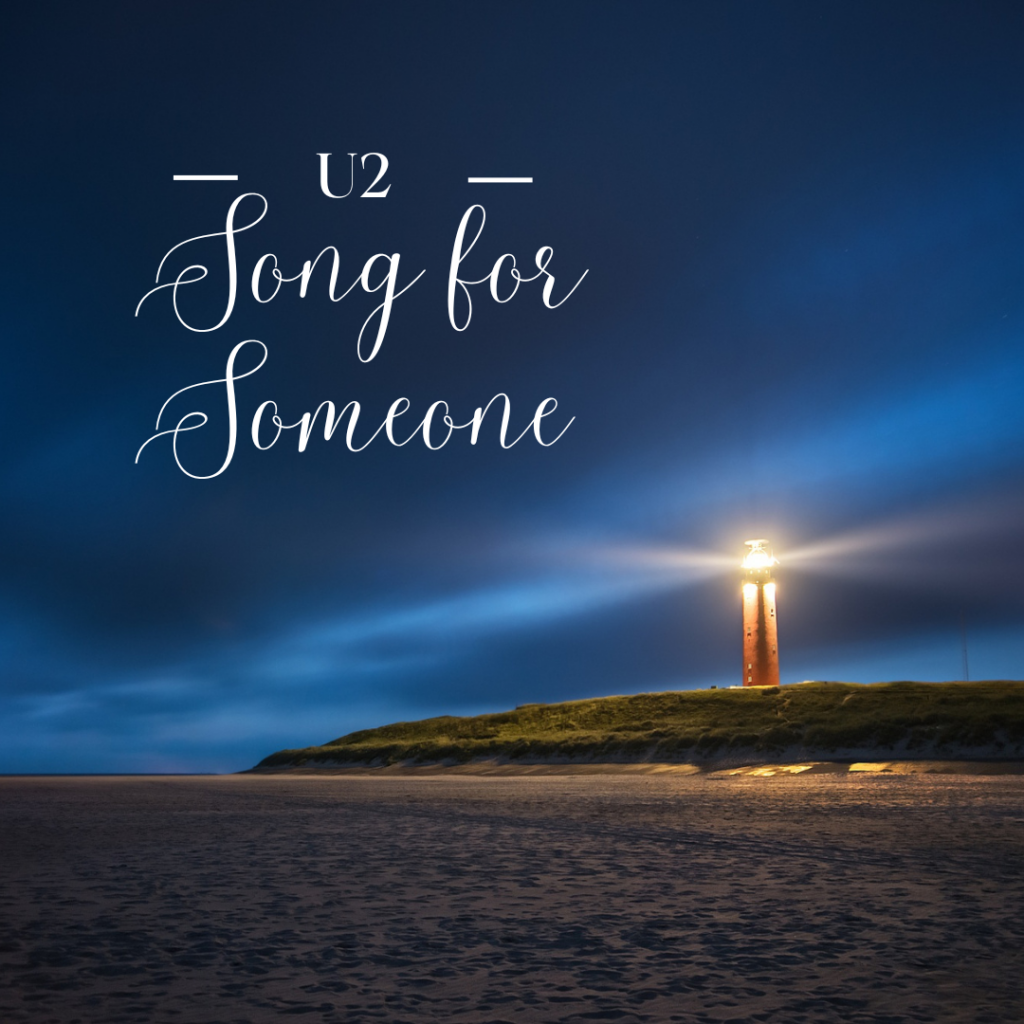 Lighthouse at deep twilight overlooking a beach. Words in white: "U2" "Song for Someone"