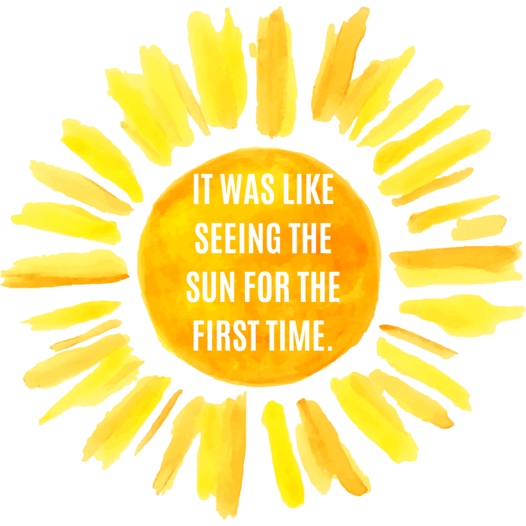 Brush-painted stylized sun in yellow and orange. Words in white over the center: "It was like seeing the sun for the first time."